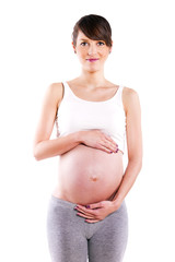 Beautiful pregnant woman - isolated over a white background..