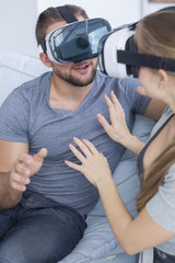Couple using Virtual Reality Glasses