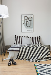 Bedroom with pattern bedding