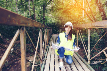 Portrait of happy smiling young engineer. Young female construct