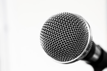 Isolated metal microphone on white background
