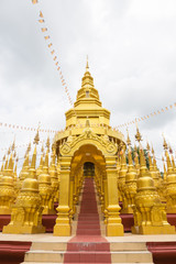 Naklejka premium Wat Pa Sawangboon temple with golden pagoda, Saraburi, Thailand