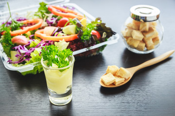 Crispy bread, Kiwi sauce and mix salad with fruit and vegetable