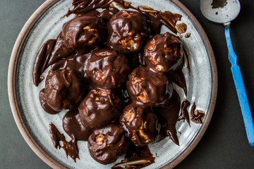 Profiteroles with chocolate cream.