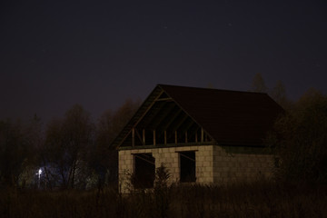 Abandoned house at night