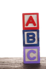 Wooden alphabet blocks isolated on white background