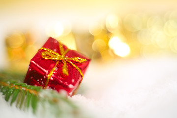 Christmas gift on snow macro
