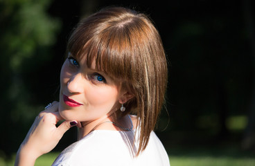 beautiful blue-eyed girl in the park