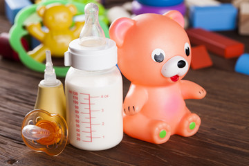 Pile of toys, collection on wooden background
