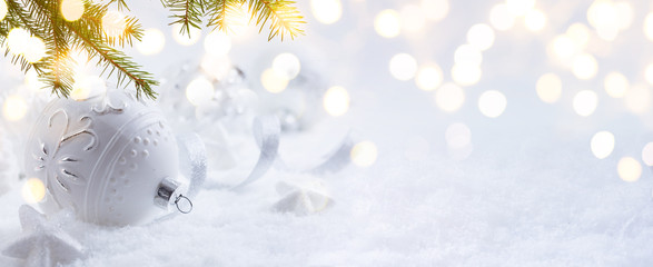 art Christmas decoration and holidays light on snow Background