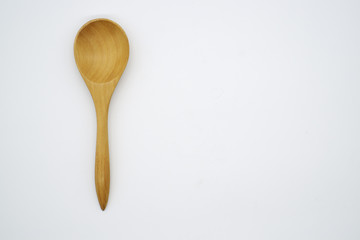 Close-up  wooden spoon isolated on white background
