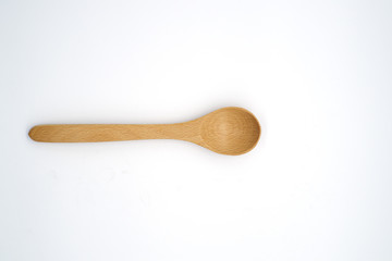 Close-up  wooden spoon isolated on white background