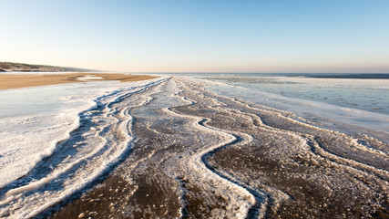 Fototapeta na wymiar frozen beach view by the baltic sea
