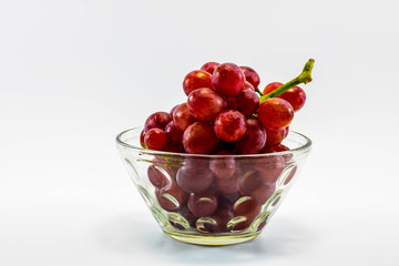 Red wine glass on a white background.