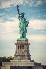 Statue of Liberty on Liberty Island on a sunny day, New York City, USA, vintage filtered style