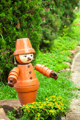 Fototapeta premium soldier ceramic doll on the way in the garden 