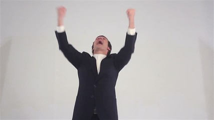 The winner, a young businessman Excitement - Powered by Adobe