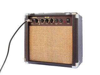 Small acoustic guitar amplifier isolated on white background