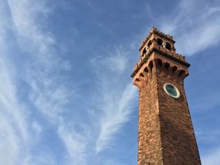 Clock tower against sky in Venice, Italy