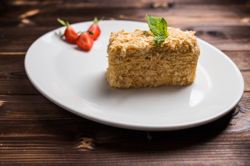 Napoleon cake on white plate