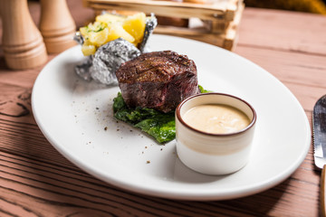 Grilled steaks and baked potatoes
