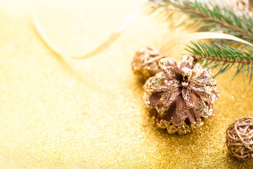 Christmas background. New year's Eve. 2017. Christmas tree, gold, cones, ornaments