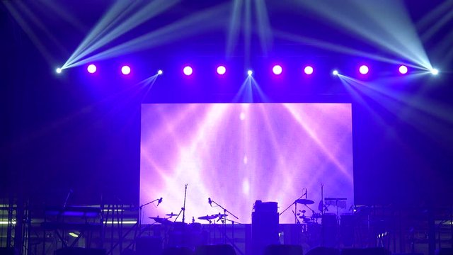 Equipped  stage with LED screen on the background is ready for a music show.