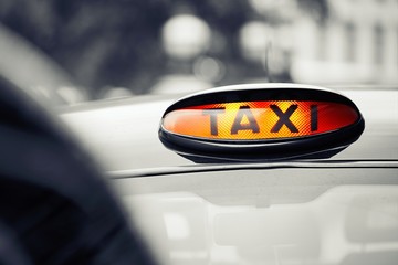 Fototapeta premium Taxi cars on the street