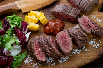 Close-up of sliced medium grilled machete beefsteak, studio shot
