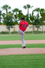 High school baseball pitcher on the mound.