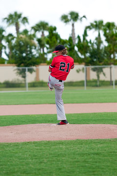 High School Baseball Pitcher On The Mound.