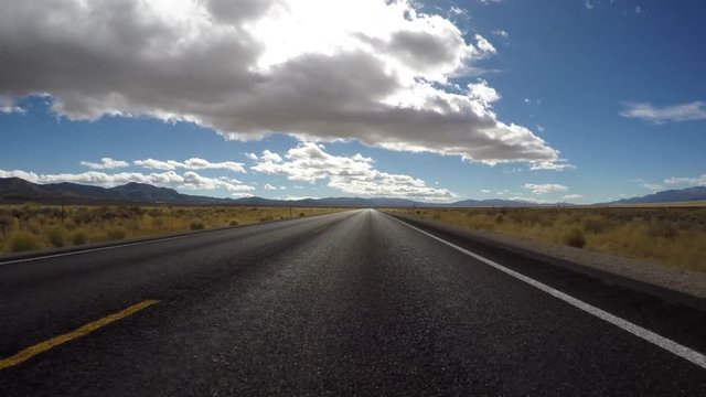 Great Basin Desert, Nevada, USA - Driving car mount on highway 50 near Great Basin National Park.