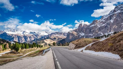 Foto op Canvas Road leading to snow capped Dolomites, Italy © shaiith