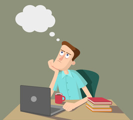 Man is thinking and sitting at the table with laptop and books. 