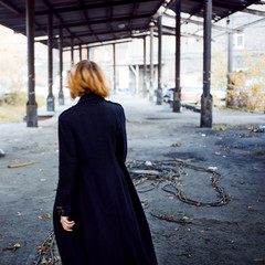 Girl in coat, one in the criminal area, back