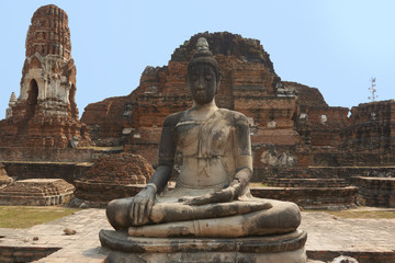 Fototapeta premium Ancient stone temple on sunny day in Ayuttaya, Thailand.