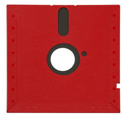 A floppy disk, also called a diskette or just disk, is a type of disk storage composed of a disk of thin and flexible magnetic storage medium, sealed in a rectangular - isolated - white background