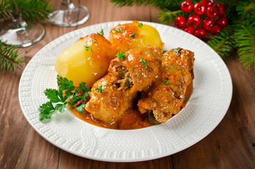 Meat rolls stuffed with bacon and pickled cucumber