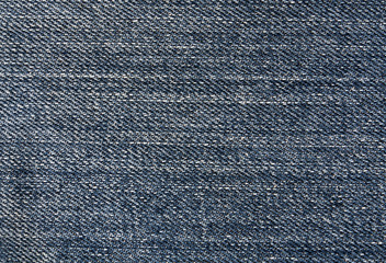 Naklejka premium Blue jeans textile surface.