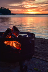 Campfire on the beach at sundown