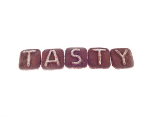 letter cookies spelling the word tasty