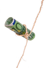 Shoestring budget euro. string or twine tied in a bow isolated on white background