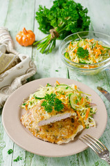 Pork chop in batter with vegetable salad