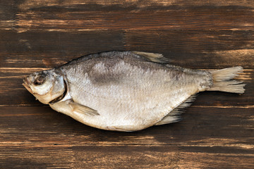 fish on dark woden background..