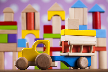 Children's of toy accessories on wooden background