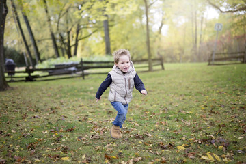 boy in autumn season in a park