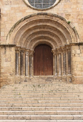 Fototapeta na wymiar Gateway of Romanesque church of Santiago, XII-XIII centuries. Coimbra, Portugal.