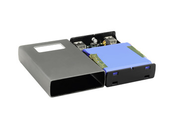 Broken Powerbank with aluminium casing on white background