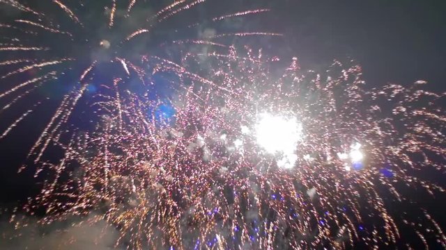 Fireworks Flashing in the Night Sky. Slow Motion