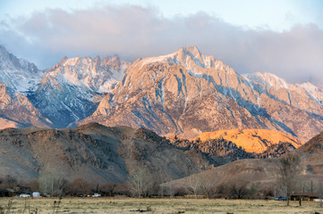 Sunrise on Mt. Whitney and the Sierra Nevada Mountains. Long Pine, California, USA. Dramatic morning sun lights on the Sierra Nevada Mountains in California.